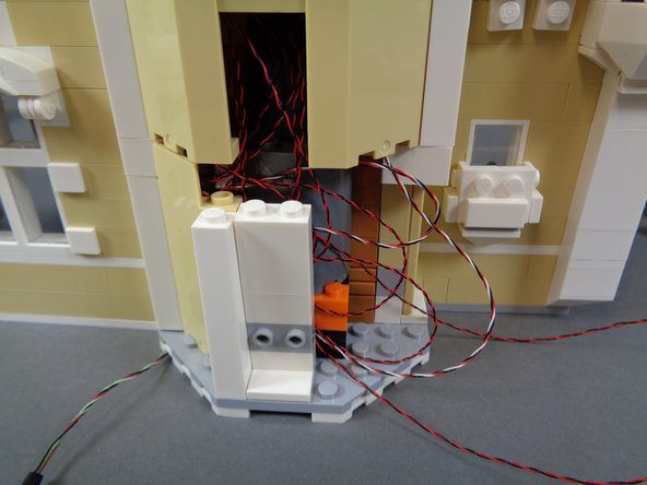 It will be a tight fit for the BRANCH09X adapter as you re-assemble the castle front, so you may need to move the adapter around slightly to fit it into its final position as you add pieces back to the front section.