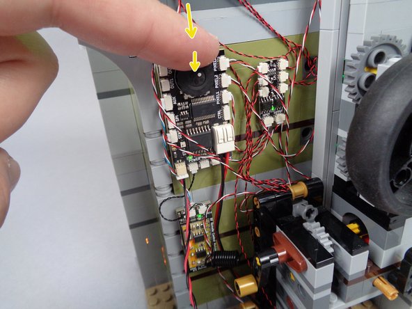 As mentioned earlier in this guide, there are two &quot;modes&quot; for the two cool white LED lights with long wires connected to the BRANCH06X adapter board mounted to the lower right side of the back of the mansion: