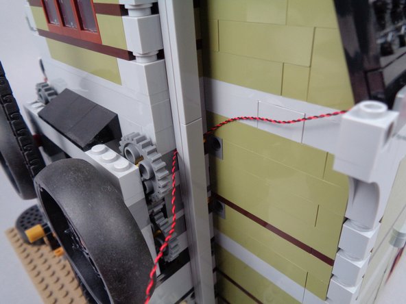 Remember to run the wires between, not on top of studs, and also to keep wires tight enough that no excess hangs near any gears.