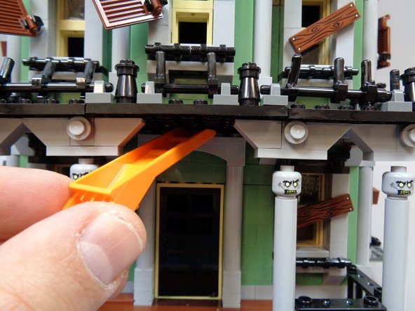 This can be a difficult process, as the bricks are attached firmly and it may be hard to pry with enough force to separate them.  This is a good reason to keep your LEGO® building instructions close by, in case you need to re-build a section of your Haunted House.