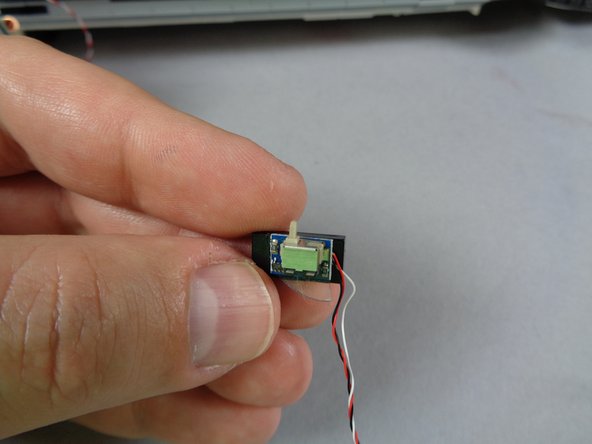 As shown by the green line in the first photo, make sure the glue disc does not extend beyond the edge of the tile.