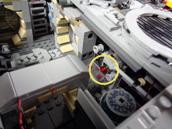 You should now have the LED light wire extending into the area near the BRANCH09X adapter board.