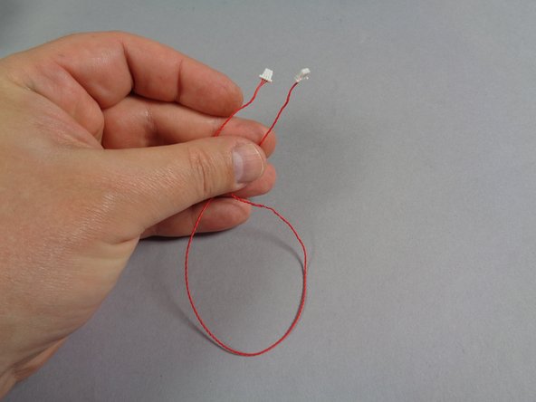 Next, you will connect the red, 3-wire control cable that will run from the roof down to the bottom of the Ecto-1.