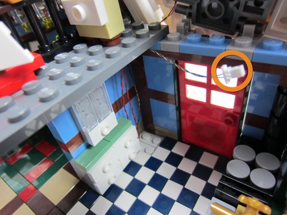 What's this extra connector plug doing, just hanging in the air?  Don't mind it-- when we did the photo shoot, we tried mounting one of our Light Strips on the ceiling of the kitchen, but that's out of scope for this guide!