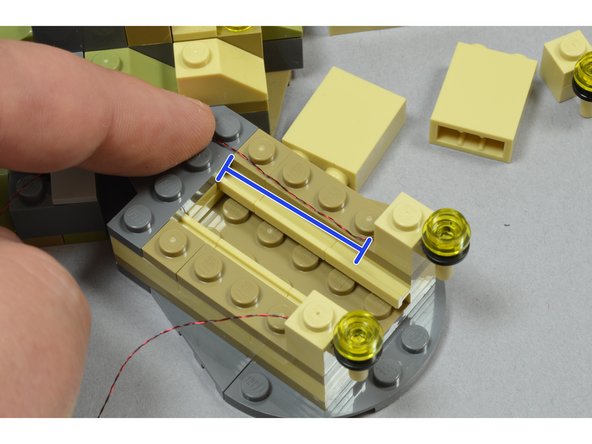 Install the two replacement dock lights as shown in the second photo.