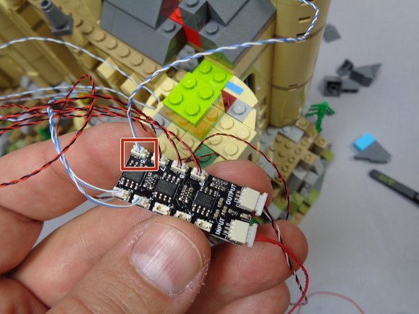 As shown by the red square in the first photo, connect the wire from the stained glass lights to plug #6 on the BRANCH09X adapter.