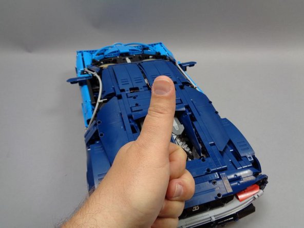 Because of the Pico LED cable inside the black Technic pin at the front of the roof, it may be difficult to fully insert the blue tube in the front.  Push carefully so you don't damage the Pico LED wires.