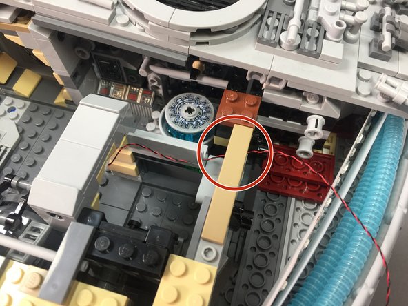 Make sure to run the wire between, not on top of, any studs under the tile.