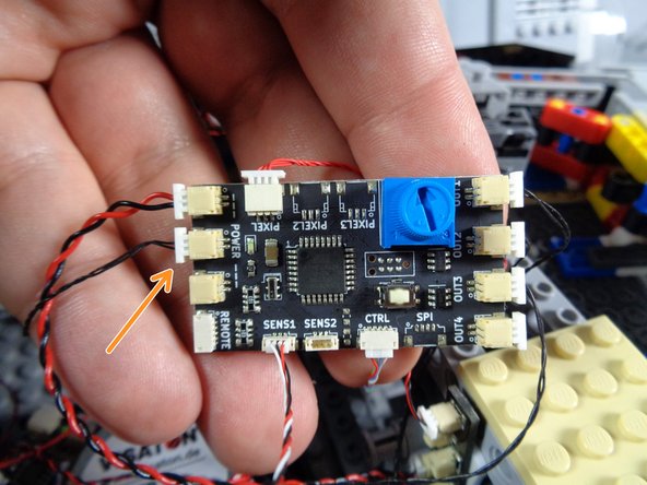 Inside the rear of your Falcon, look for either the 1/2 BRANCH11 or BRANCH18 adapter (whichever was provided with your old kit), and find the specific plug to which the magnetic switch black cable is connected.