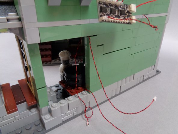 As shown in the photos for this step, replace the kitchen window, wall pillar, and corner column.