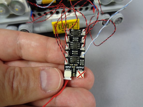 All nine small plugs on the BRANCH09X adapter should now be filled.