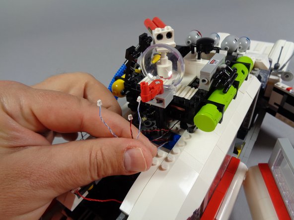 Next, you will connect the three front lights to the BRANCH09X adapter board.