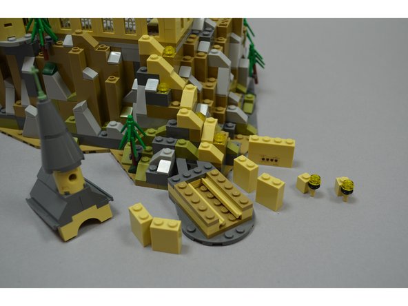 As shown in the photos for this step, carefully remove the top parts of the boathouse.  This is where you will begin your installation.