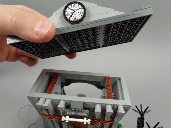 As shown in the third photo for this step, remove the roof of the town hall.