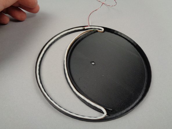 The third photo for this step shows the completed strip mounted inside the crescent moon frame.