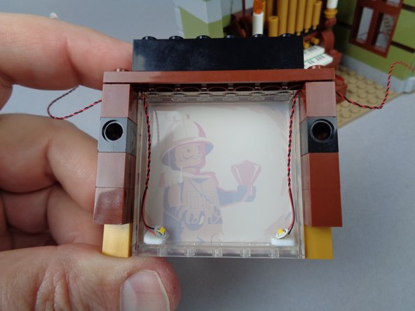 As with all of the other lights you have mounted, make sure the light wire passes between, not on top of, any studs.