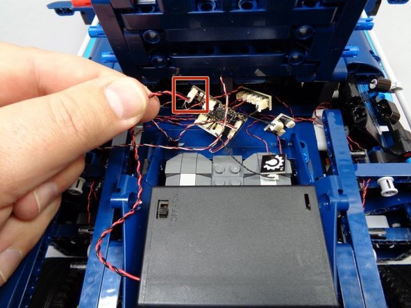 Your lighting kit includes a USB cable for power, but if you want to have your Bugatti lighting 100% self-contained, you can also use our 3AA battery pack (sold separately) to power the set.  This step shows how to mount the battery pack if you decide to use it instead of the USB cable.