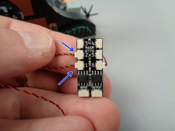 As shown by the arrows in the third photo for this step, connect the pumpkin LED lights to plugs #1 and #2 on the BRANCH06X driver board.