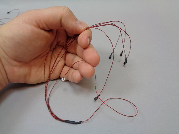 Inside the "Central Power Parts" bag, there will be one cable with 5 connectors on one end as shown in the first photo.