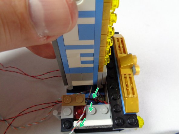 The most important part of this step is to make sure that no wires get pinched under the top (caught in the black plates underneath) when re-attaching the top.