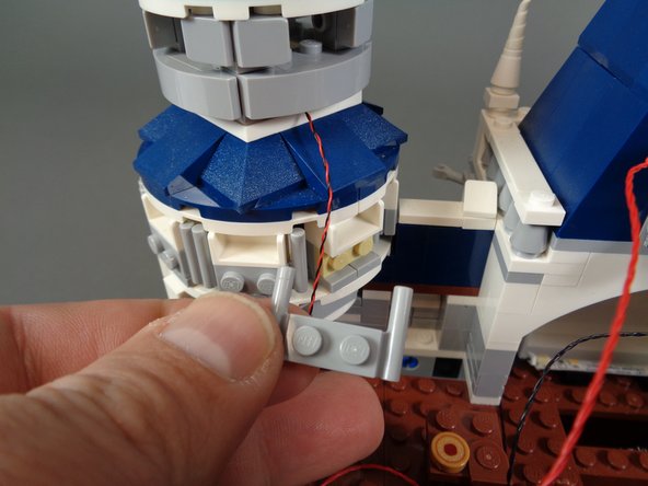 Because the LED light wire bends so tightly here, take extra care to make sure it does not become pinched.