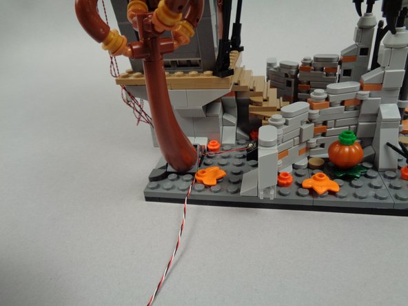 Make sure not to pinch any wires in the hinge itself when re-attaching the tree.