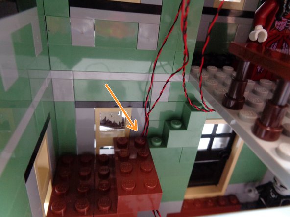 leave just enough wire to reach the BRANCH09X adapter board on the ceiling.  There will be a lot of extra wire coming from the fireplace-- you will hide that under the stairs later in this step.