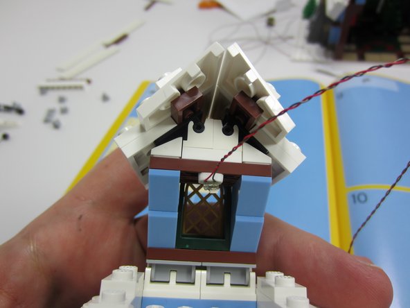 If adhesive is required to hold the board in place, you can use one of the self-adhesive squares that are supplied with each Micro Light Board kit.