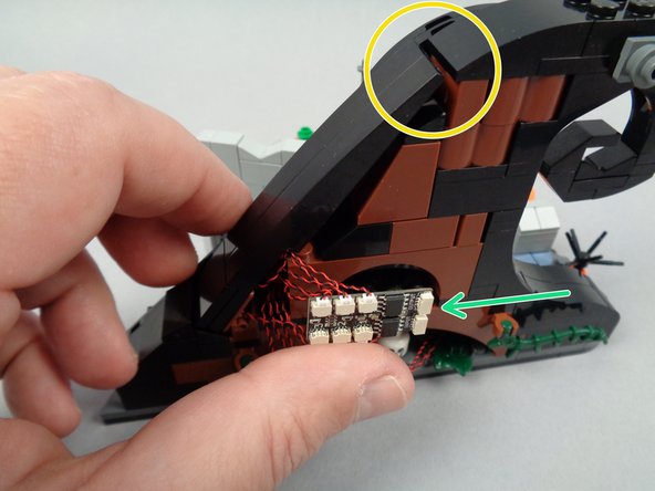 Be careful not to pinch any wires inside the hinge!