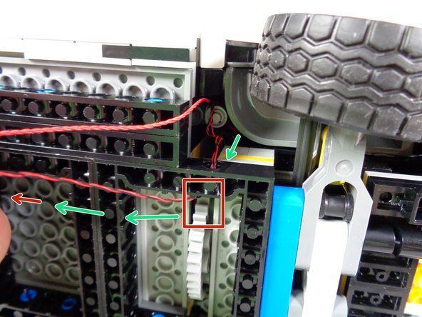 Carefully turn your Ecto-1 onto its side, laying it on a flat surface with plenty of space to work.