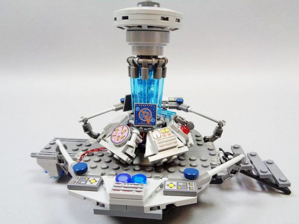 Finally, re-attach the transparent rods around the central core.