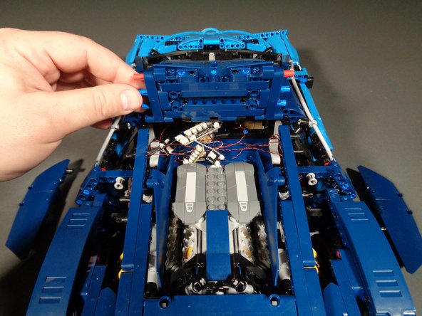 As shown in the second photo, you should now be able to flip up the rear window.