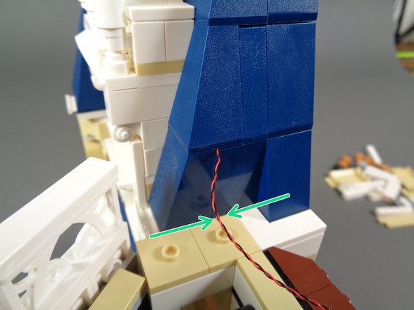 Re-attach the remaining blue roof slope pieces.