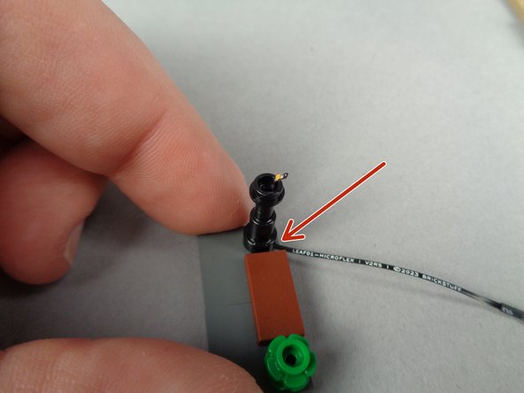 The photos for this step show how to re-attach the lamp post to its base after you have inserted the Microflex LED light.