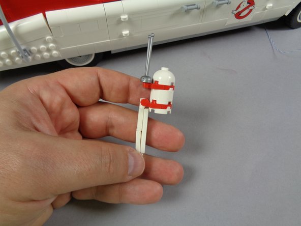 The radome part is shown in the second photo.  Do not re-attach this part now, as you will still need to turn your Ecto-1 on its side in future steps.  You can save the radome to be attached at the very end.