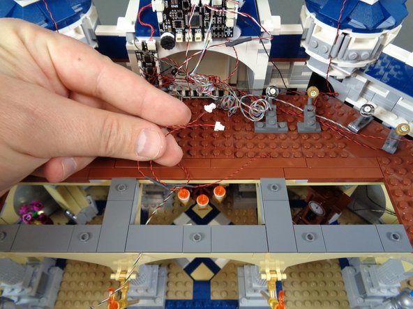 Make sure all light wires run between, not on top of, studs.