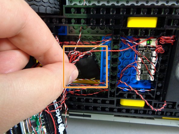 Finally, you will mount the main controller to the bottom of your Ecto-1.