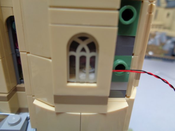 Your light should look like the light in the first photo (centered behind the window).