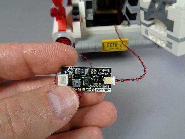 As shown in the first photo for this step, connect the heavy-duty connecting cable to the smaller plug on the LiPo power source.