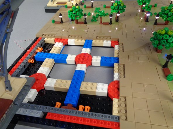 As shown in the three photos for this step, remove the large Panel 3 next.