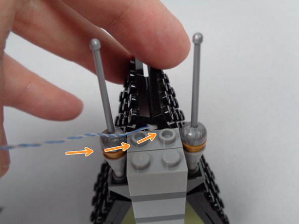 As shown in the second photo for this step, you will have a small LED light remaining in your BOX #1.  This LED light has a blue/white wire, unlike the other LED lights with your kit which have red/black wires.