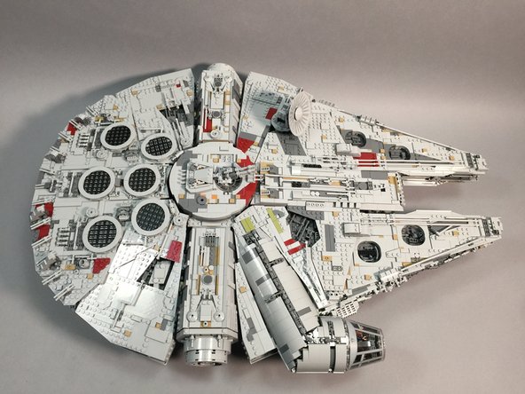 Now it is time to re-attach the top panels on the Falcon, including the tops of the docking bays. Using the LEGO® instructions if necessary to see how to re-attach the panels, carefully re-assemble your ship.