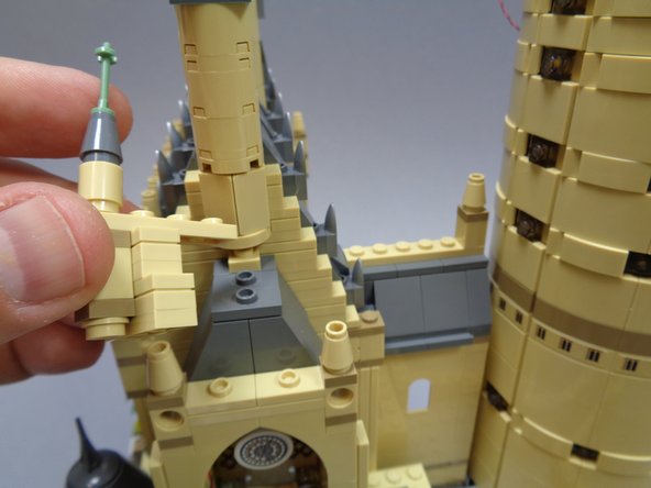 Complete re-assembling the clock tower as shown.