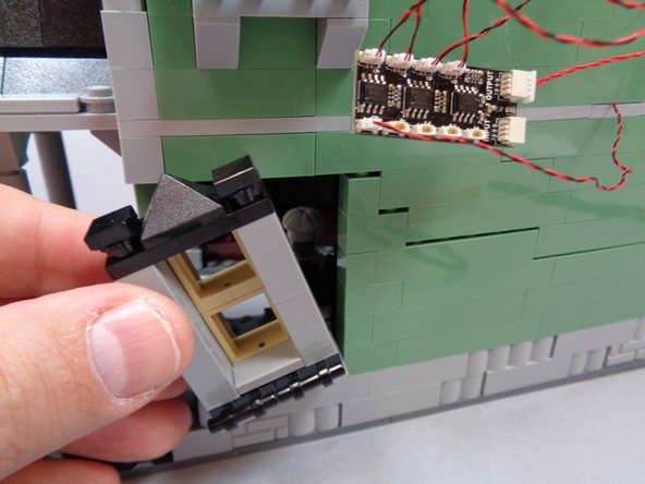 As shown in the third photo, mount the green Pico LED light on the kitchen ceiling above the stove.  The light wire should extend out the back of the kitchen wall.