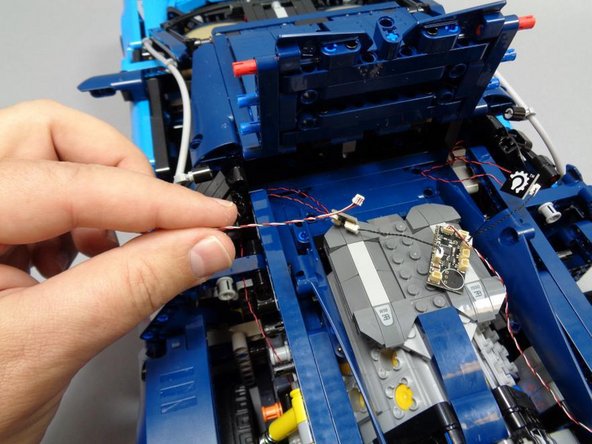 In this step, you will connect the 3-wire headlight cable to the main controller board.