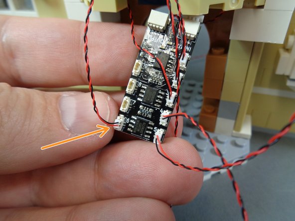 If you chose not to complete the disassembly of the front of the castle, you will pull the light wire down directly into the kitchen.