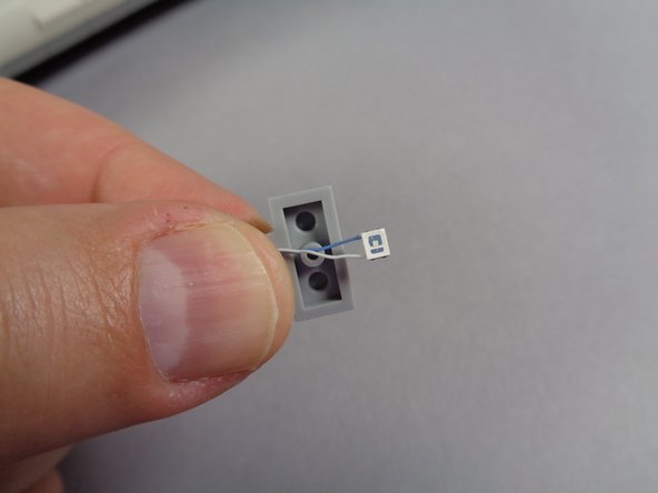 This is the same process you used earlier to mount lights in the two front roof lights.