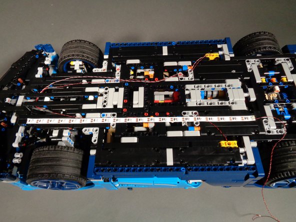 Make sure to mount the strip with the connecting wire and plug toward the REAR of the car.