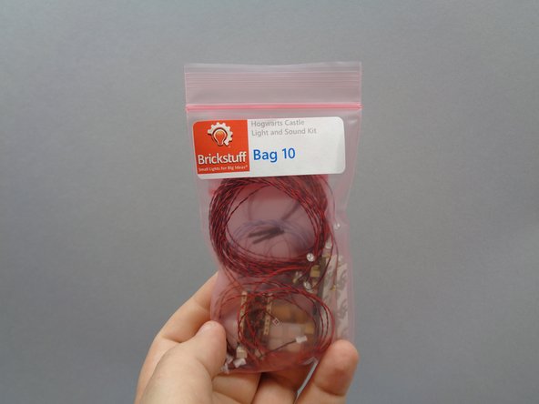 Open Bag 10.  Inside there should be one 12&quot; 2-wire connecting cable.  As shown in the second photo, connect one end of that cable to the other large plug on the BRANCH15 adapter board.