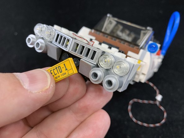 Re-attach the hood parts you removed in Step 2.